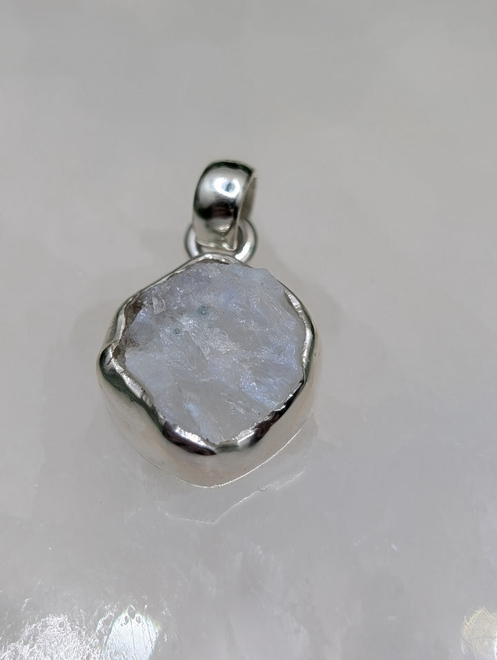 Raw Enclosed Sterling Silver Pendant