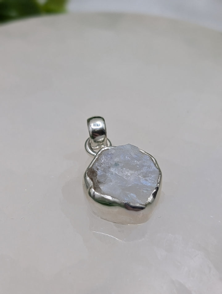 Raw Enclosed Sterling Silver Pendant